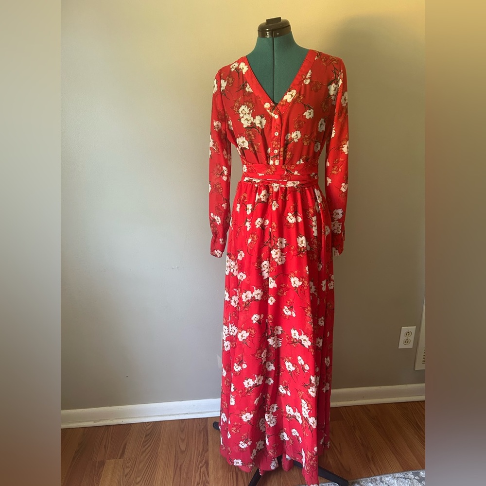 Vibrant red with floral designs see through from knees to bottom